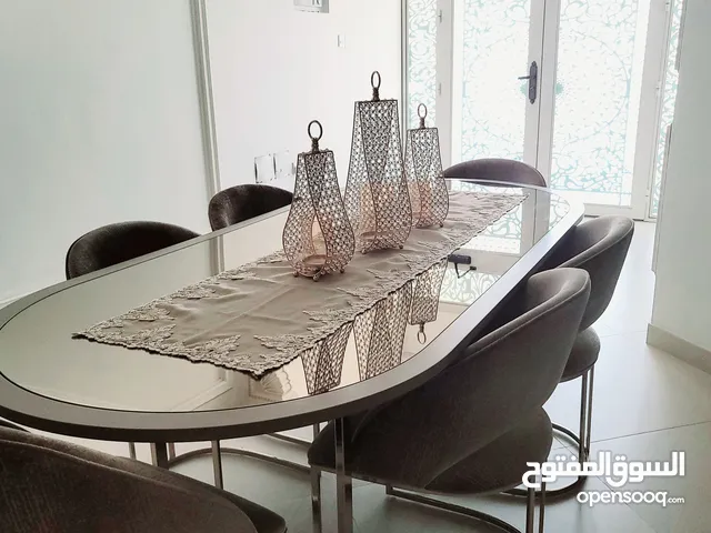 Luxurious 6 Seat Dining Table, Suede Chairs and tempered heat resistant glass