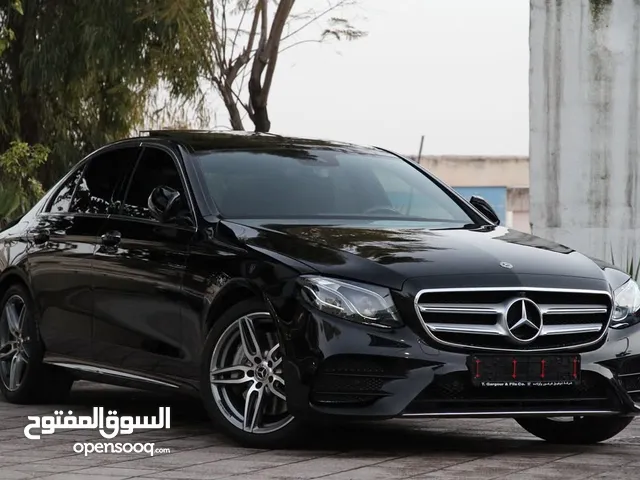 Mercedes E350 Mild Hybrid 2019 وارد غرغور Kit AMG حالة ممتازة وصيانة وكالة.
