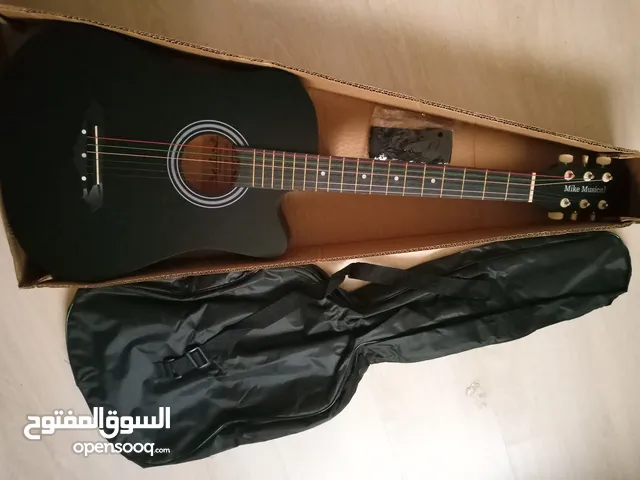 غيتار جديد مقاس 38 انش مع حقيبة تم ضبط الأوتار و تجربته مناسب للمبتدئين سبب البيع: عدم الحاجة له