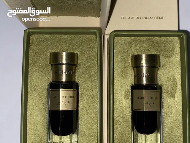 دهن عود عنبر دور من الشمع
