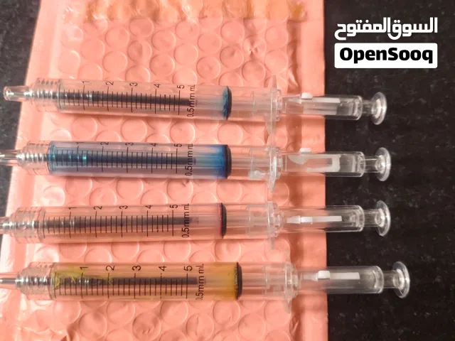 اقلام حبر على شكل حقن