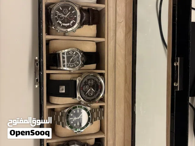 Rolex submariner  and titanium quartz and police and aigner and guess and boss