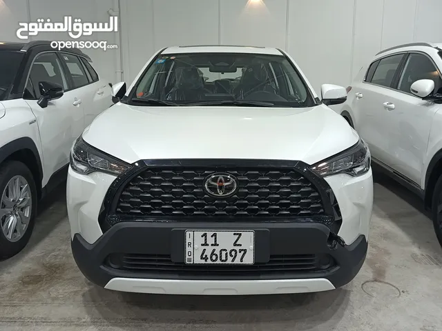تويوتا كورلا كروس هايبرد 2024 زيرو صفر كيلو رقم بغداد الجديد فول مواصفات 1/1 كرسي كهرباء وبصمه فتحة