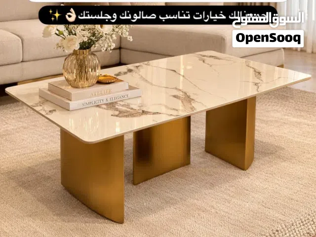طاولات وسط وجانبية بلون الذهبي المميز والون البني