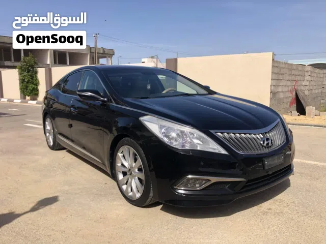 أزيرا 2013 دار  ماشي 79 فل كامل لون اسود محرك 30