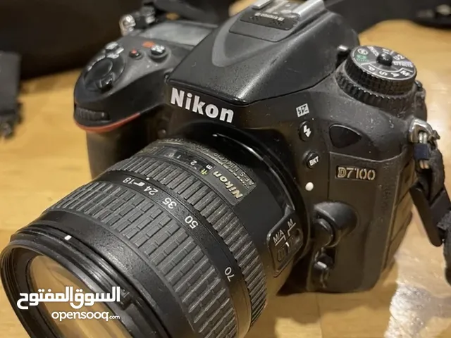 Nikon D7100 with lens 18-70