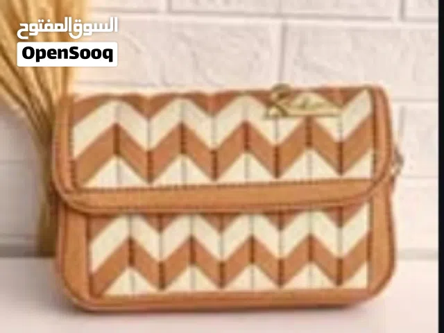 شنطة كروس حريمي أنيقة نقشة زجزاج (بيج في جملي)