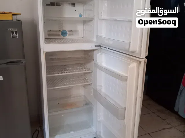 Sharp, white color big size freezer for sale, neat and clean, Original parts