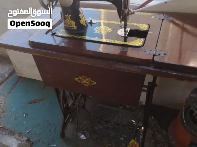 ماكينه خياطه رجل