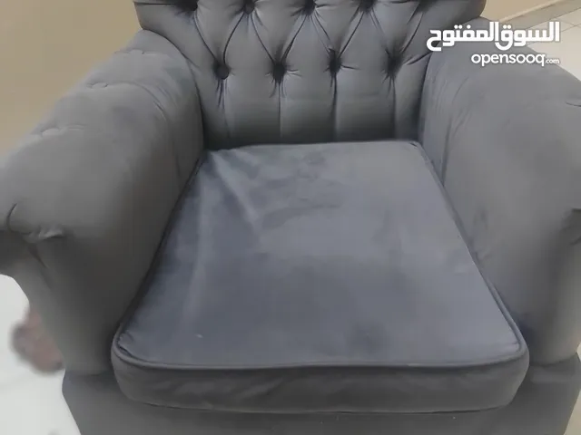Grey color single sofa