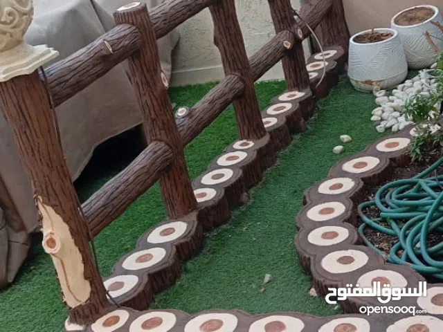 تنسيق حدائق قص أشجار شلالات صيانه