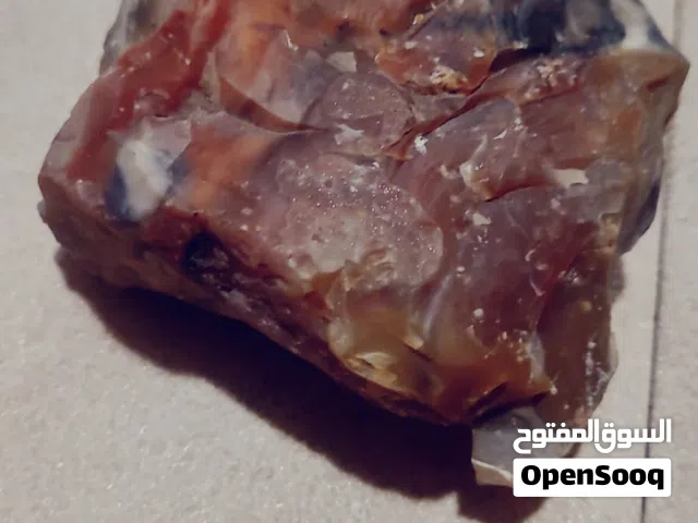 حجر العقيق الطبيغي الناري الأحمر و حجر العقيق البني والأصفر