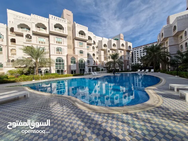 2 BR + Maid’s Room Flat in Muscat Oasis with Shared Pools & Gym