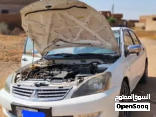 لانسر بومه 2006 قير عادي تكييف تلجه قوائم فل خالي ملاحيظ عربيه الصلاه علي النبي بنزينك والشارع