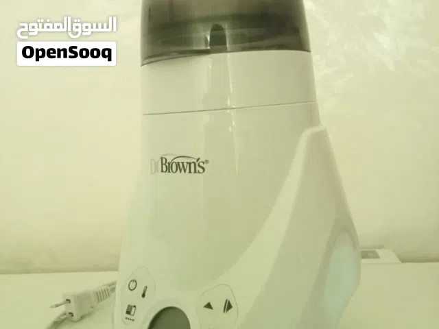 جهاز محضر لرضعات الحليب الكهربائي