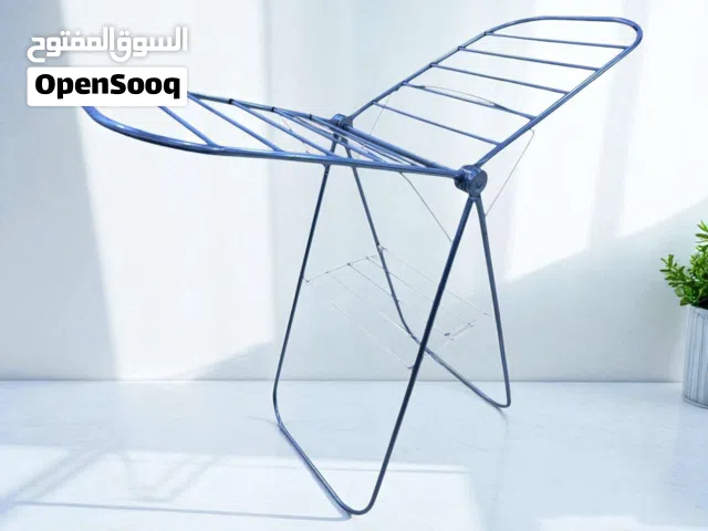 مشرة ملابس حديدية