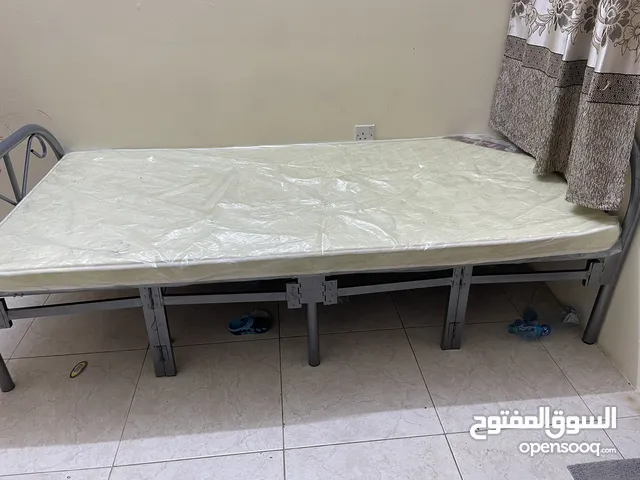 Single bed without cover opened with folding type cot for sale