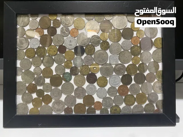لوحه أثريه تشمل تشكيله من العملات النادره و القيمه القديمه عربيه و غربيه مصنوعه على شكل موزيك اثري