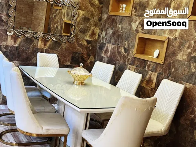 طاولة سفرة 8 كراسي موديرن مع وجه خارجي سيكوريت كامل لوجه الطاولة