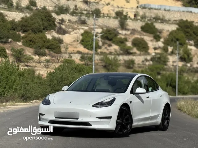 Tesla Model 3 Standerd Plus 2021 فحص كامل جمرك جديد ارباج سليم فل كامل لون مميز بسعر مغري جداااااا