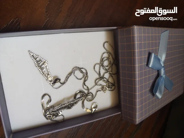 سنسال وسوارة فضة