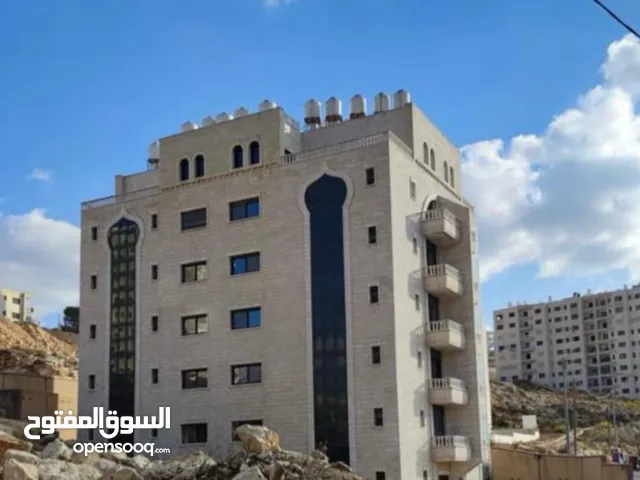 عماره  كامله للبيع 6 طوابق يوجد فيها 20شقه بيرزيت  مساحه الارض دونم