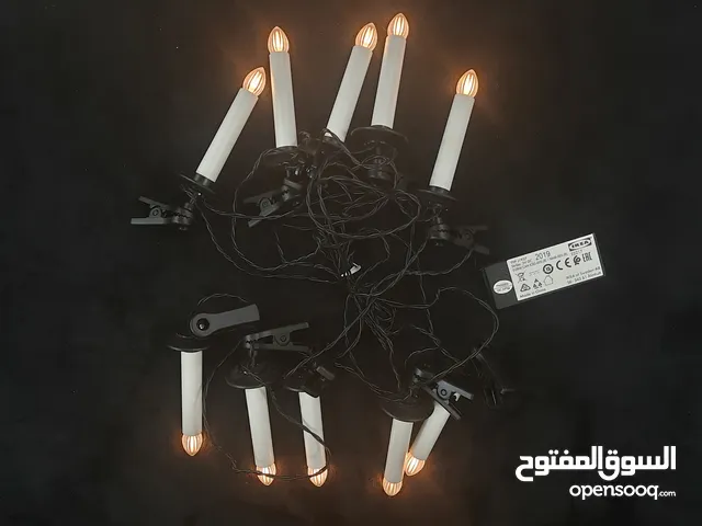 أضاءة IKEA تعمل بل بطاريه شكل اشموع +كلبسات جديد