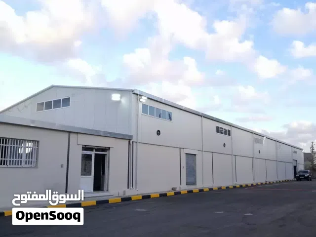تصنيع وتركيب الهناجر والمظلات والمساكن الجاهزة والحاويات والتريلات