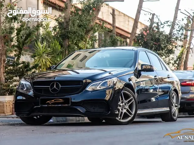 Mercedes E200 Avantgarde Amg kit 2015 السيارة وارد و بحالة الوكالة