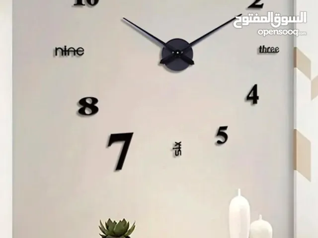 ساعة حائط لاصقة