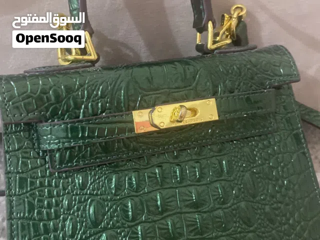 شنط يد تقليد