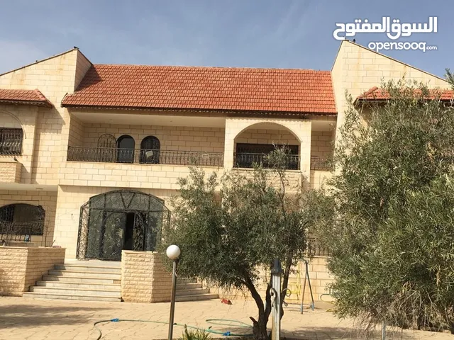 1000 m2 More than 6 bedrooms Villa for Sale in Madaba Umm Al Amad