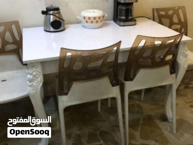 ميز طعام ربع كراسي