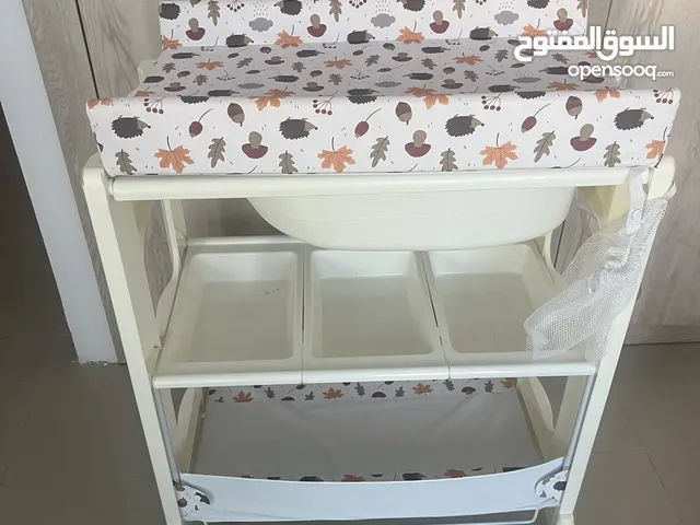 Baby changing table and bathtub