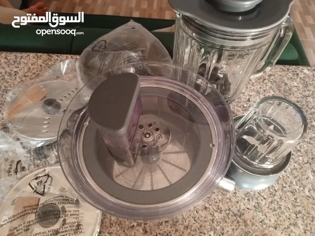 خلاط كونيووود مع مطحنه مع عصارة مع محضرة طعام وخفاقه مع شفرات ومعصرة ليمون