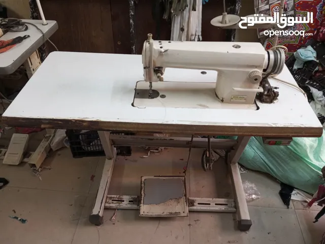 مكنه خياطه سنجر موتور خرجي بحاله جيده بسعر رخيص