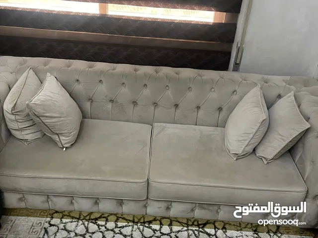 طقم كنب ثلاثية وثنائية