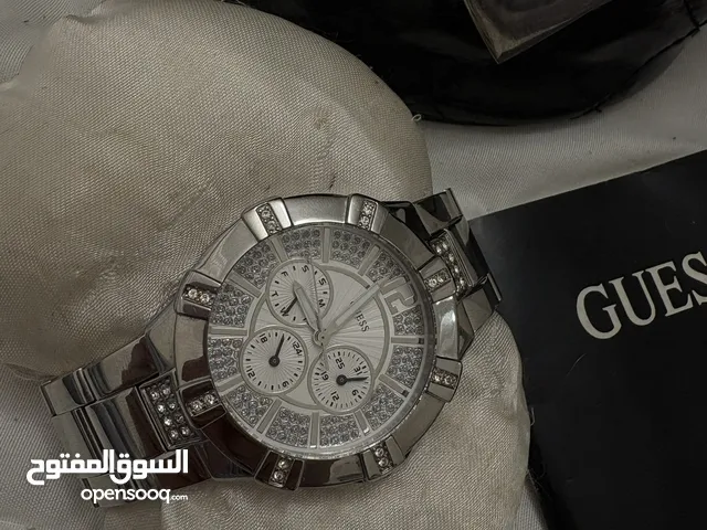 ساعه guess اصليه لون فضي