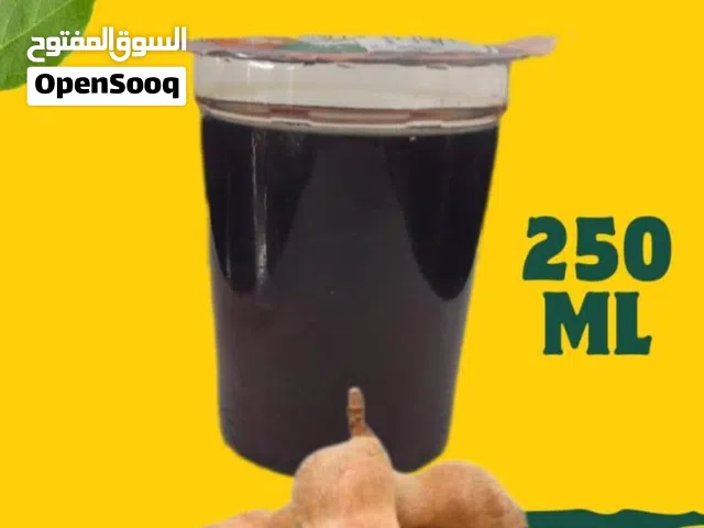 كراتين كاسات عصير تمر هندي وليمون