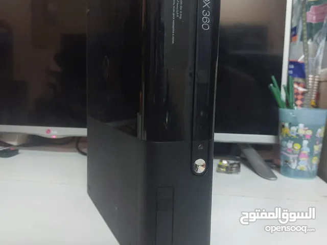 XBOX 360E WITH 5 GAMES