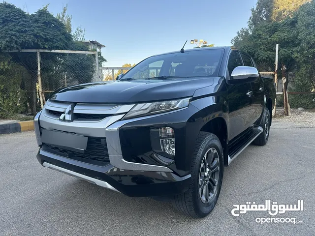 ميتسوبيشي L200 سبورتيرو موديل 2022 وارد الشركة أعلى صنف مع ديفلوك مالك واحد للبيع