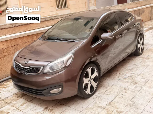 كيا ريو 2015 نوع EXمستعملة بحالة ممتازة مع مواصفات خليجية  إلي بيدور علي حاله نضيه