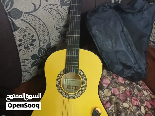 جيتار مستعمل حال الجديد مع شنطته مع الشنطه