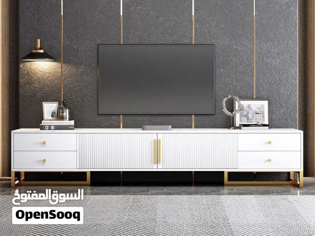 خزانة تلفزيون خشبية بشكل عصري لون ابيض و ذهبي بجرارات جانبية و خزانات المقاس  160*30*40سم