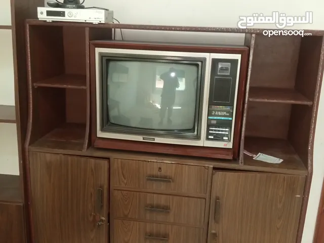 طاوله تلفزيون وتلفاز ومكتبه من الزمن الجميل