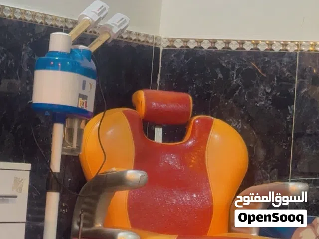كرسي حلاقه وجهاز بخاري