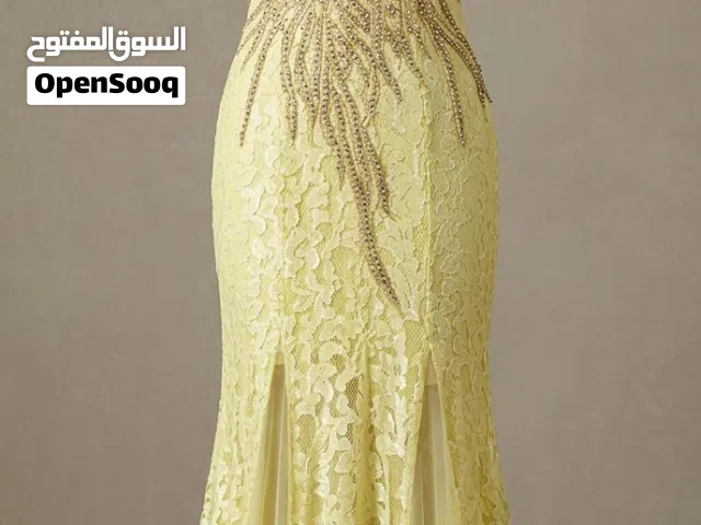 فستان سواريه أصفر راقي تطريز مميز