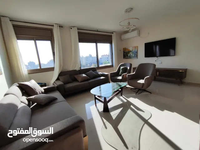 شقة بإطلالة عالية في قلب عين منجد – فرصة لا تعوّض