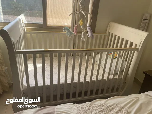 Baby bed with mattress and. Hang toy