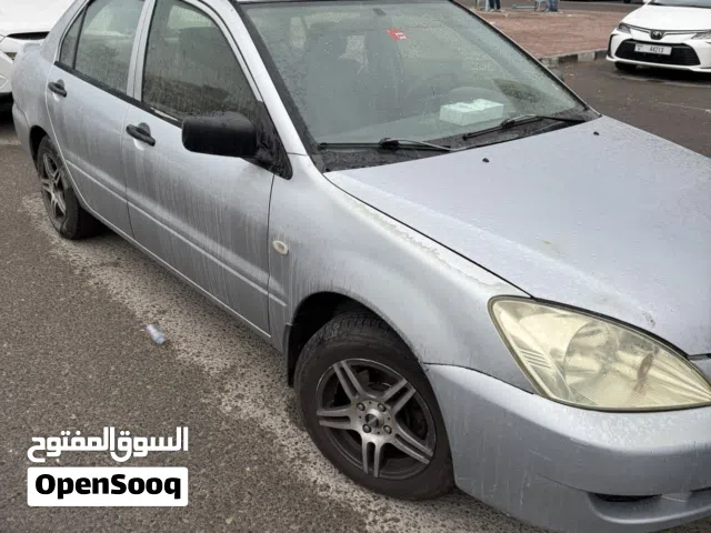 2012 ميتسوبيشي لانسر Standard
